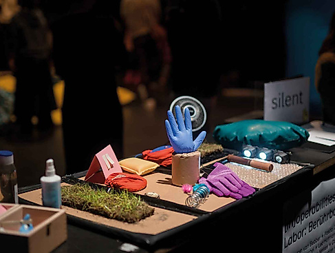 Colorful gloves on a table.